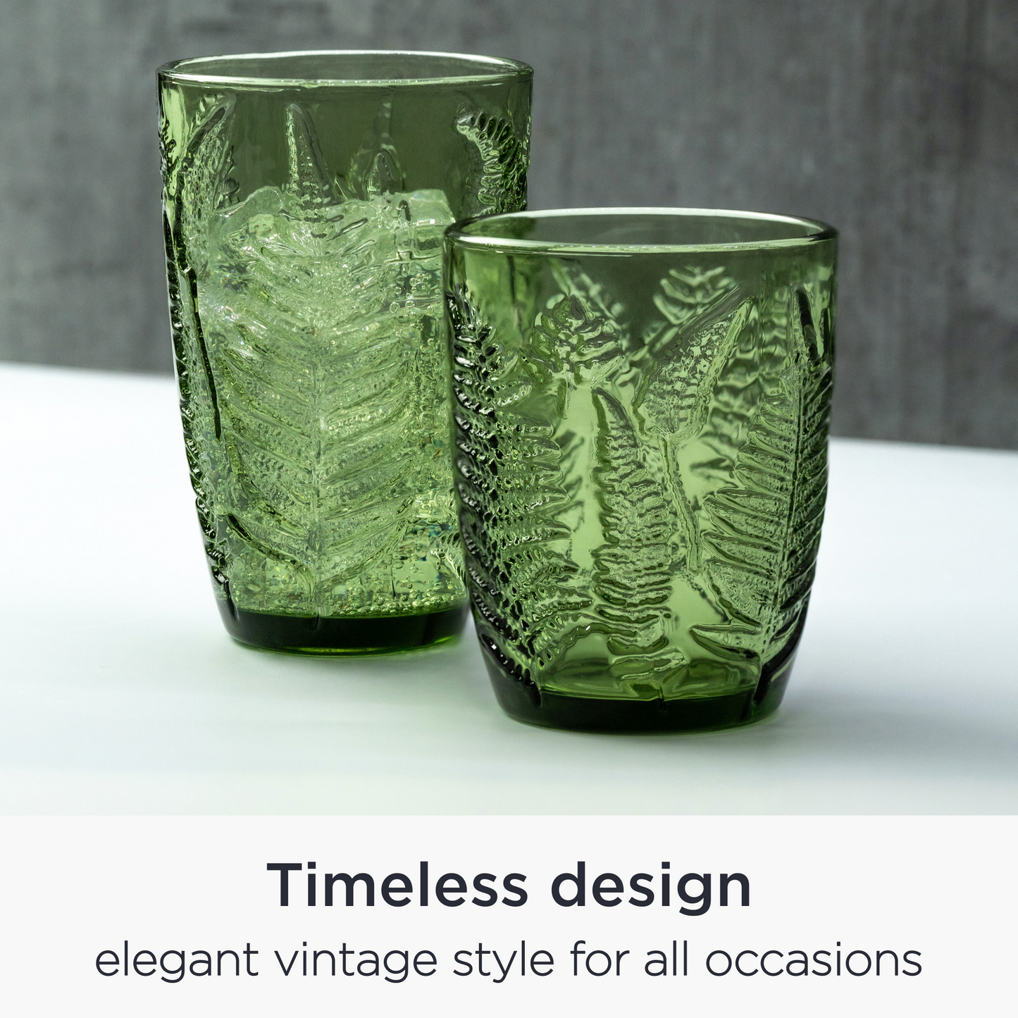 Side view of 10 oz green glass tumbler showcasing textured floral design