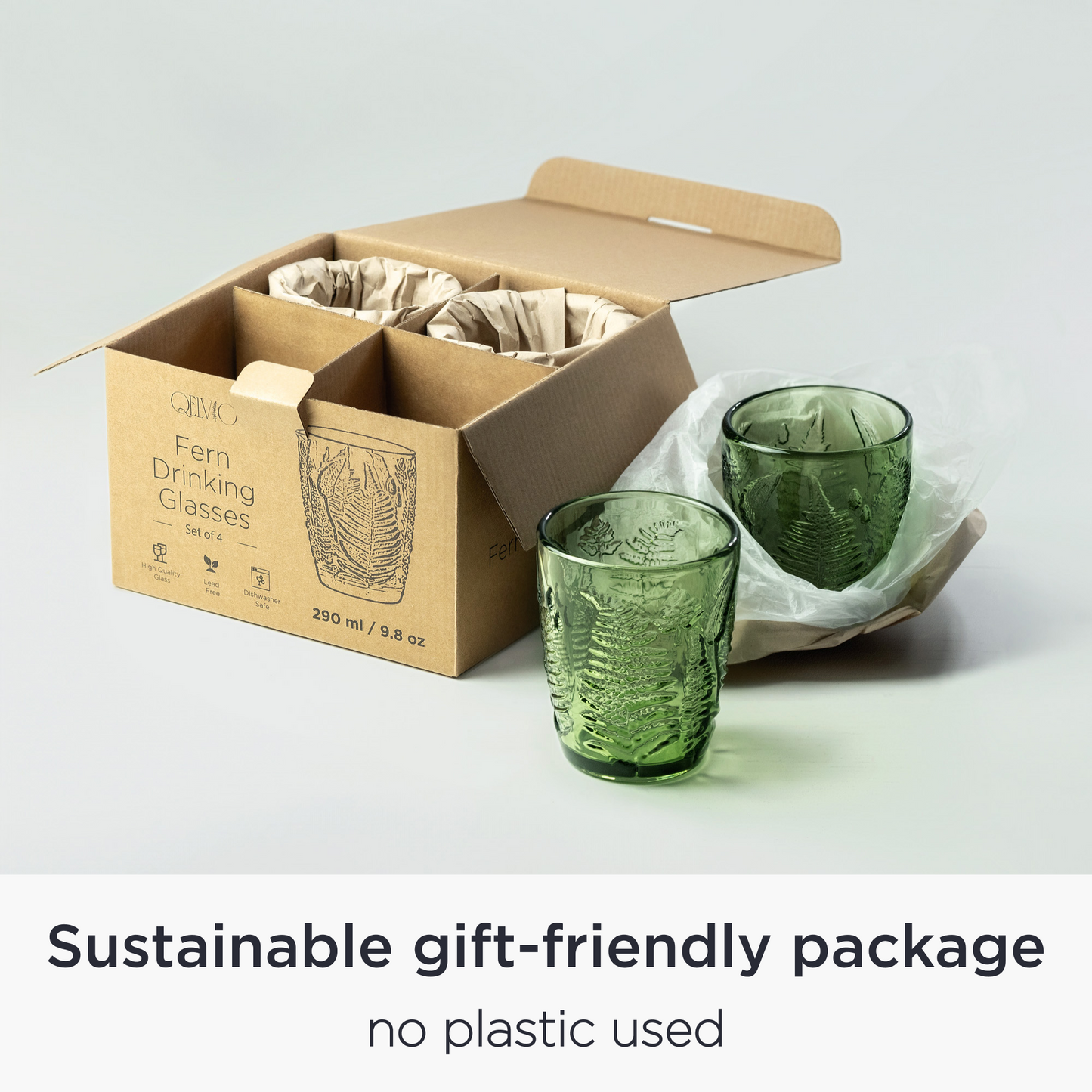 Boxed set of four green vintage drinking glasses with protective packaging